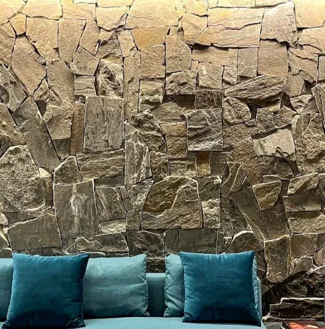 Parede com pedra Miracema Bossa Nero bloquinho em ambiente interno sofisticado